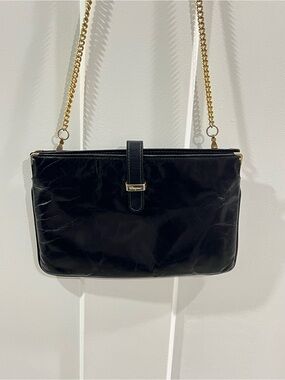 Salvatore Ferragamo soft
Black Leather Chain Crossbody Bag